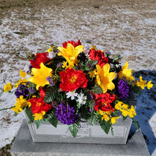 Load image into Gallery viewer, This is a Headstone Saddle with Trumpet Lillies, Peonies, mums, and delphinium. It is a memorial arrangement for a funeral or cemetery.