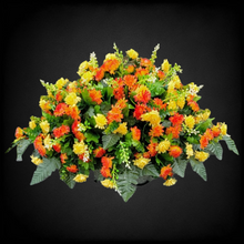 Load image into Gallery viewer, This Large Headstone Saddle has grave flowers including Orange Mix Mini-Mums. It is a funeral or memorial decoration.