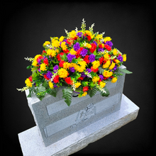 Load image into Gallery viewer, This Headstone Saddle has grave flowers including Multi-Colored Mini Mums. It is a perfect funeral or cemetery decoration.