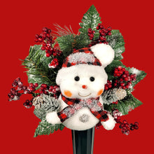 Load image into Gallery viewer, This cemetery cone pair comes with a cute smiling snowman, red berries, and a stocking cap. It is 2 Christmas memorial decorations.