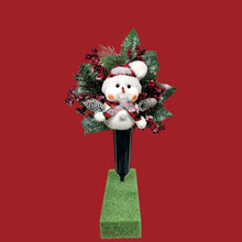 Load image into Gallery viewer, This cemetery cone pair comes with a cute smiling snowman, red berries, and a stocking cap. It is 2 Christmas memorial decorations.