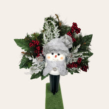 Load image into Gallery viewer, This cemetery cone comes with a cute smiling snowman, red berries, and a gray stocking cap. It is a Christmas memorial decoration.