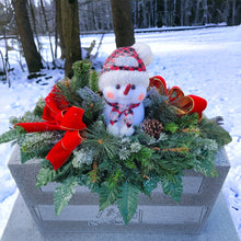 Load image into Gallery viewer, This Chubby Snowman Christmas cemetery saddle has greenery and a red velvet bow. It is a winter memorial decoration.