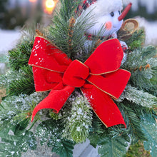 Load image into Gallery viewer, This Chubby Snowman Christmas cemetery saddle has greenery and a red velvet bow. It is a winter memorial decoration.