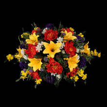 Load image into Gallery viewer, This is a Headstone Saddle with Trumpet Lillies, Peonies, mums, and delphinium. It is a memorial arrangement for a funeral or cemetery.