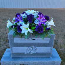 Load image into Gallery viewer, Headstone Saddle with purple & white trumpet lilies and purple roses. It is a grave flower cemetery, funeral, or memorial decoration.
