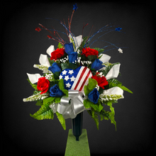 Load image into Gallery viewer, This patriotic memorial cemetery cone has grave flowers including red, white, and blue calla lilies & roses and American flag heart.