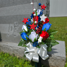 Load image into Gallery viewer, This patriotic memorial cemetery cone has grave flowers including red, white, and blue rosebuds and glitter stars.