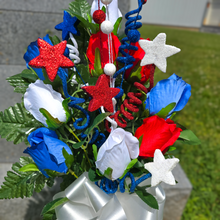 Load image into Gallery viewer, This patriotic memorial cemetery cone has grave flowers including red, white, and blue rosebuds and glitter stars.