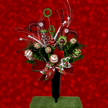 Load image into Gallery viewer, Christmas memorial decoration with red & green elf shoes, glitter accented picks, and a festive bow.