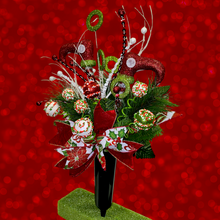 Load image into Gallery viewer, Christmas memorial decoration with red & green elf shoes, glitter accented picks, and a festive bow.