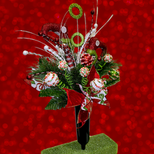 Load image into Gallery viewer, Christmas memorial decoration with red & green elf shoes, glitter accented picks, and a festive bow.