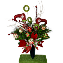 Load image into Gallery viewer, Christmas memorial decoration with red & green elf shoes, glitter accented picks, and a festive bow.