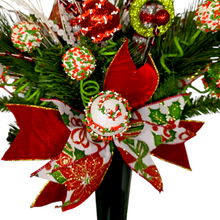 Load image into Gallery viewer, Christmas memorial decoration with red & green elf shoes, glitter accented picks, and a festive bow.