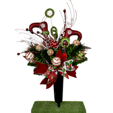Load image into Gallery viewer, Christmas memorial decoration with red & green elf shoes, glitter accented picks, and a festive bow.