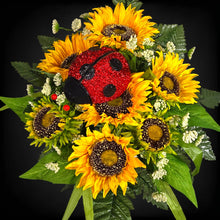 Load image into Gallery viewer, A cemetery cone with grave flowers including yellow sunflowers and a ladybug. This is a memorial decoration or flowers for funeral.