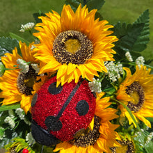 Load image into Gallery viewer, A cemetery cone with grave flowers including yellow sunflowers and a ladybug. This is a memorial decoration or flowers for funeral.