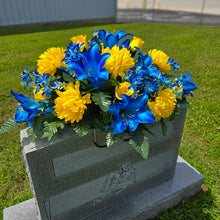 Load image into Gallery viewer, This Headstone Saddle has grave flowers including Vibrant Blue Trumpet Lilies, Bright Yellow Mums, & Rosebuds. It is a memorial decoration.