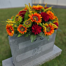 Load image into Gallery viewer, This Headstone Saddle is made with grave flowers including Orange Sunflowers and Burgandy Mums. It's a summer or fall memorial decoration.