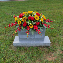 Load image into Gallery viewer, This Headstone Saddle is made with grave flowers including sunflowers and geraniums. It&#39;s a memorial decoration..
