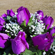 Load image into Gallery viewer, Headstone saddle with purple rosebud grave flowers. It is a funeral, cemetery, or memorial decoration.
