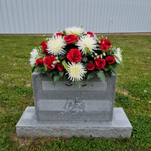 Load image into Gallery viewer, A headstone saddle with red roses and cream mum grave flowers for cemetery, funeral, and memorial decorations.
