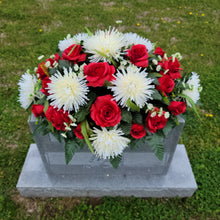 Load image into Gallery viewer, A headstone saddle with red roses and cream mum grave flowers for cemetery, funeral, and memorial decorations.
