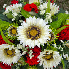 Load image into Gallery viewer, This Headstone Saddle is made with grave flowers including cream sunflowers and red geraniums. It's a memorial decoration.. (Copy)
