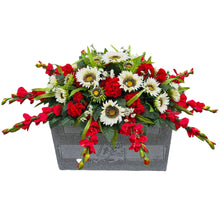 Load image into Gallery viewer, This Headstone Saddle is made with grave flowers including cream sunflowers and red geraniums. It's a memorial decoration.. (Copy)
