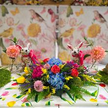 Load image into Gallery viewer, Decorative table setting with floral arrangements and rabbit figurines against a floral-patterned backdrop.
