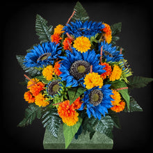 Load image into Gallery viewer, Blue Sunflower Cemetery Cone with Orange &amp; Yellow Mini Mums. Funeral Memorial Flowers
