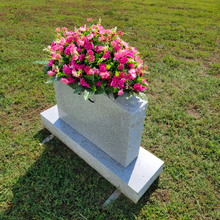 Load image into Gallery viewer, This Headstone Saddle has grave flowers including Beauty Pink Mini Mums. It is a perfect funeral or cemetery decoration.
