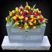 Load image into Gallery viewer, This Headstone Saddle has grave flowers including Multi-Colored Mini Mums. It is a perfect funeral or cemetery decoration.
