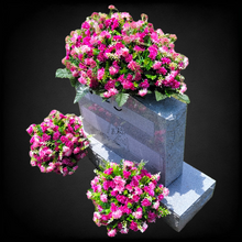 Load image into Gallery viewer, This is a Headstone Saddle with cemetery cones; it has grave flowers including Beauty Pink Mini Mums.
