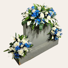 Load image into Gallery viewer, This headstone saddle and cemetery cone set has silk grave flowers including Cream Calla Lilies and Roses and Blue Tweedia.
