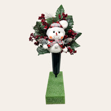 Load image into Gallery viewer, This cemetery cone comes with a cute smiling snowman, red berries, and a stocking cap. It is a Christmas memorial decoration.
