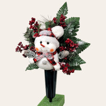 Load image into Gallery viewer, This cemetery cone pair comes with a cute smiling snowman, red berries, and a stocking cap. It is 2 Christmas memorial decorations.
