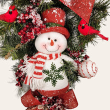 Load image into Gallery viewer, This is a teardrop door hanging that is festive for the Christmas season. It has a snowman, berries, cardinals, and 2 holiday bows.
