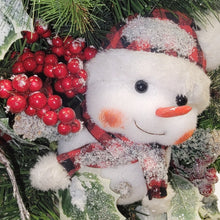 Load image into Gallery viewer, This is a teardrop door hanger that is a festive swag for Christmas season. It has berries, pinecone, snowballs, cute snowman, and a bow.
