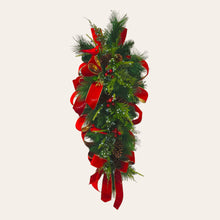 Load image into Gallery viewer, This is a teardrop door hanger festive swag for Christmas season. It has red &amp; blue berries, pinecones, cardinals, and red velvet ribbon.
