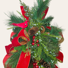 Load image into Gallery viewer, This is a teardrop door hanger festive swag for Christmas season. It has red &amp; blue berries, pinecones, cardinals, and red velvet ribbon.
