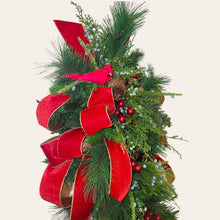 Load image into Gallery viewer, This is a teardrop door hanger festive swag for Christmas season. It has red &amp; blue berries, pinecones, cardinals, and red velvet ribbon.
