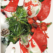 Load image into Gallery viewer, This teardrop door hanging wreath is a festive swag for the Christmas season. It has 2 snowmen, pine, berries, and 2 types of ribbon.
