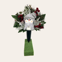 Load image into Gallery viewer, This cemetery cone comes with a cute smiling snowman, red berries, and a gray stocking cap. It is a Christmas memorial decoration.
