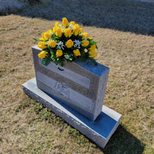 Load image into Gallery viewer, Headstone saddle with yellow rosebud grave flowers. It is a funeral, cemetery, or memorial decoration.
