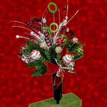 Load image into Gallery viewer, Christmas memorial decoration with red &amp; green elf shoes, glitter accented picks, and a festive bow.
