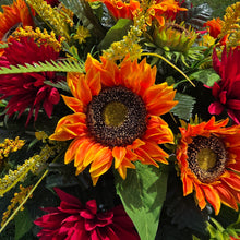 Load image into Gallery viewer, This Headstone Saddle is made with grave flowers including Orange Sunflowers and Burgandy Mums. It's a summer or fall memorial decoration.
