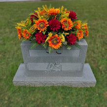 Load image into Gallery viewer, This Headstone Saddle is made with grave flowers including Orange Sunflowers and Burgandy Mums. It's a summer or fall memorial decoration.
