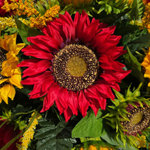Load image into Gallery viewer, This Headstone Saddle is made with grave flowers including Yellow and Red Sunflowers. It's a summer or fall memorial decoration.
