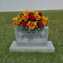 Load image into Gallery viewer, This Headstone Saddle is made with grave flowers including Orange Sunflowers and Burgandy Mums. It's a summer or fall memorial decoration.
